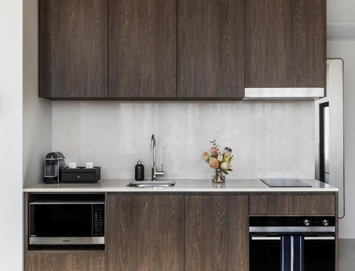 Oakwood Premier Melbourne Aparthotel Exterior foto A kitchen in a typical apartment