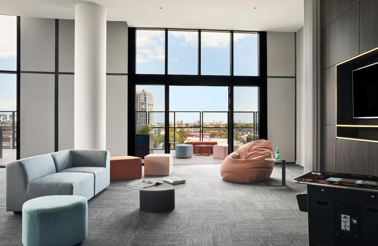Oakwood Premier Melbourne Aparthotel Exterior foto The common room at the new residence hall